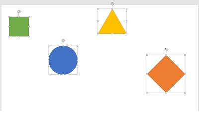 4つの図形がスライドにバラバラに挿入されている