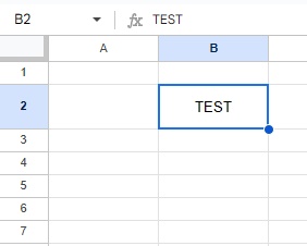 B2セルの文字列を垂直方向で中央揃えに変更