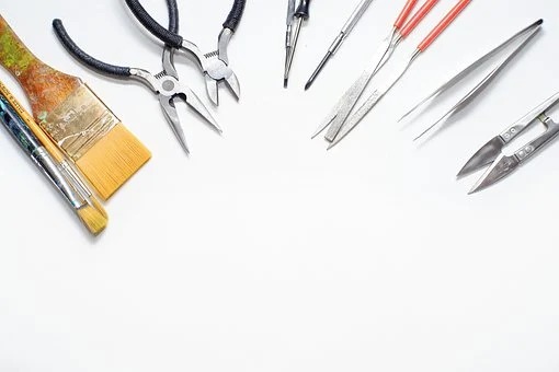 ③留め具をしめる