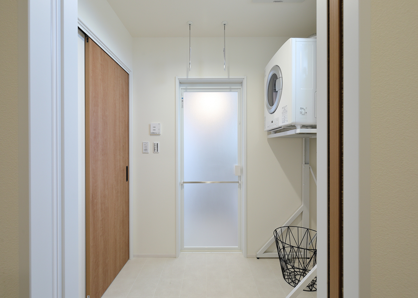 丸昇彦坂建設【子育て、収納力、間取り】家事ラクの広々としたランドリースペース。家事動線を考慮した間取りも見どころ