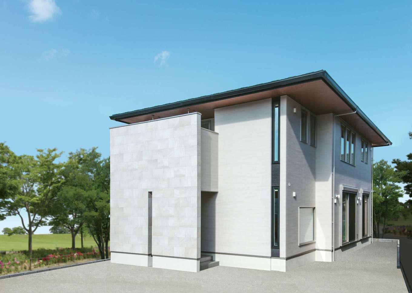 静鉄ホームズ【デザイン住宅、間取り、インテリア】「美術館や博物館のイメージで」と奥さまが希望した外観は、タイルと縦スリット窓で洗練されたデザインに