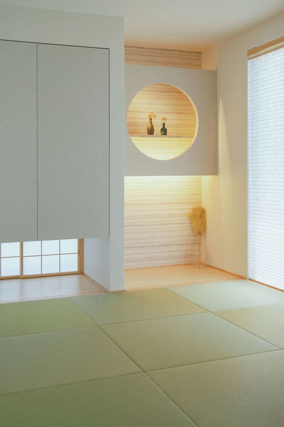 Yamaguchi Design 【磐田市見付1853‐20・モデルハウス】リビングに面した畳コーナー。シンプルなデザインに円窓の棚や障子戸でアクセントをプラス