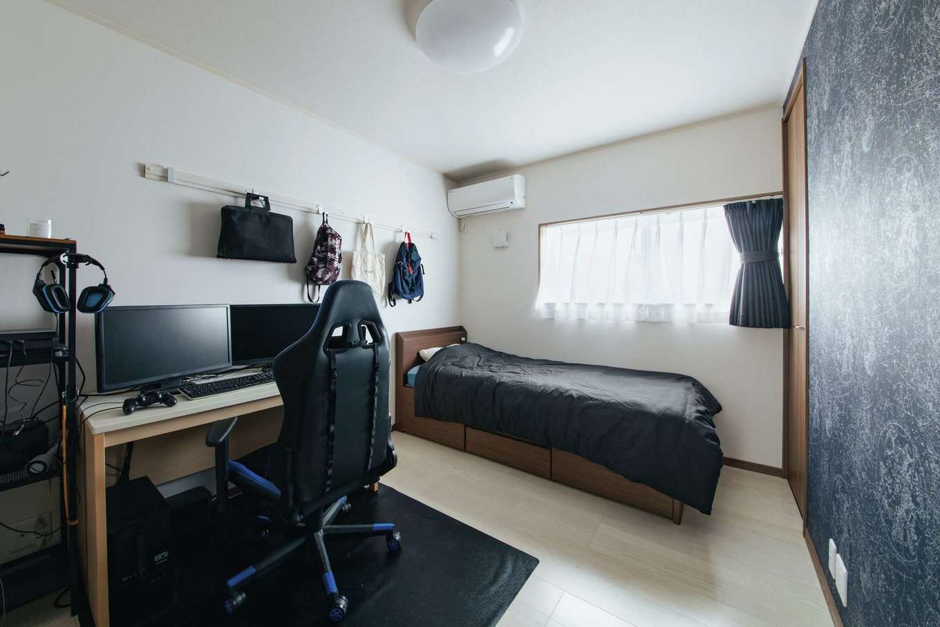 子育て安心住宅 Design Craft Office｜続きの2間を区切り、2つの子ども部屋に。現在はご主人が使用