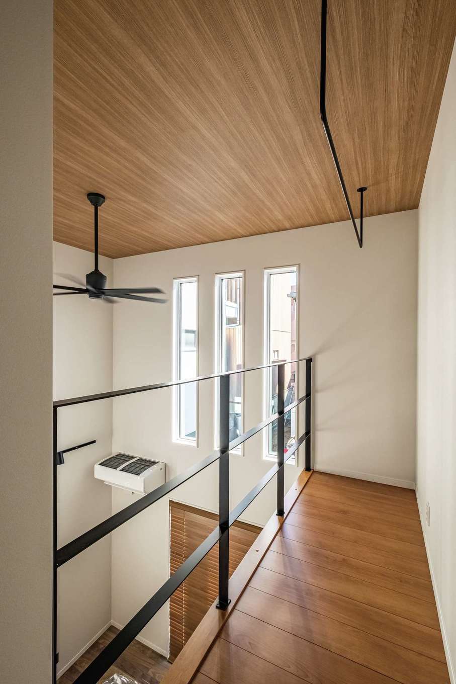 アフターホーム【1000万円台、デザイン住宅、間取り】2階ホールを壁で仕切らず、手すりにしたことで視線が抜け、より開放感が生まれた