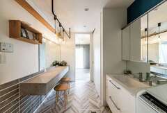 収納力と回遊性を備えたサニタリールームが奥さまの今までの不満を一気に解消