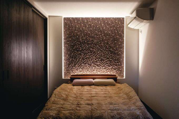 ラグジュアリーな雰囲気を演出し、くつろぎ感を極めた主寝室