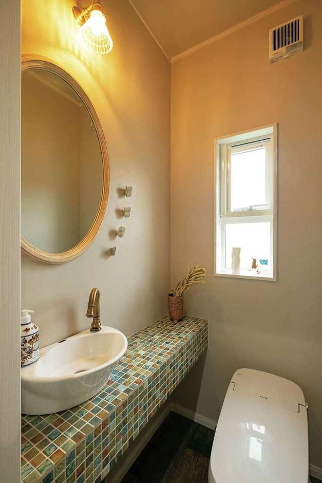 14畳のLDKを2階に。夫婦それぞれの夢を叶えた店舗付き住宅