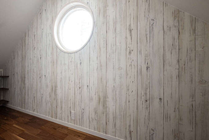 14畳のLDKを2階に。夫婦それぞれの夢を叶えた店舗付き住宅