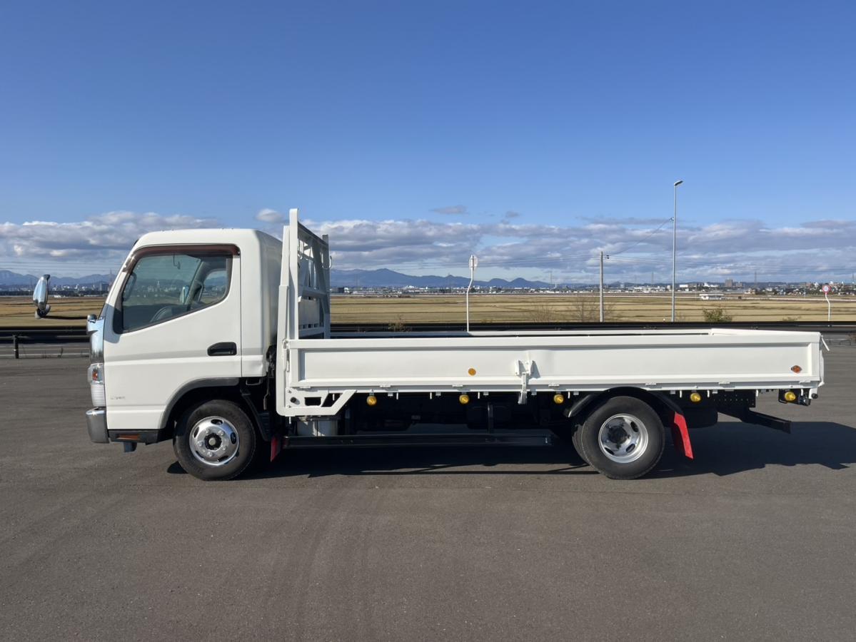 平成26年キャンターワイドロング平ボディー準中型免許可|中古トラックの販売・買取・査定のアイナビ