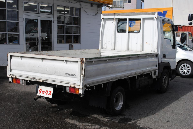 H16 タイタンダッシュ 9尺平ボディ 積載1.35t|中古トラックの販売・買取・査定のアイナビ