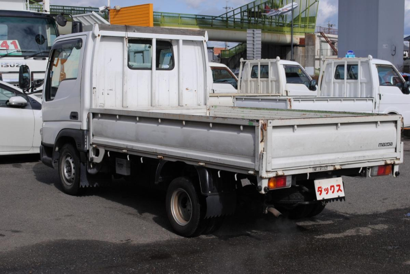 H16 タイタンダッシュ 9尺平ボディ 積載1.35t|中古トラックの販売・買取・査定のアイナビ