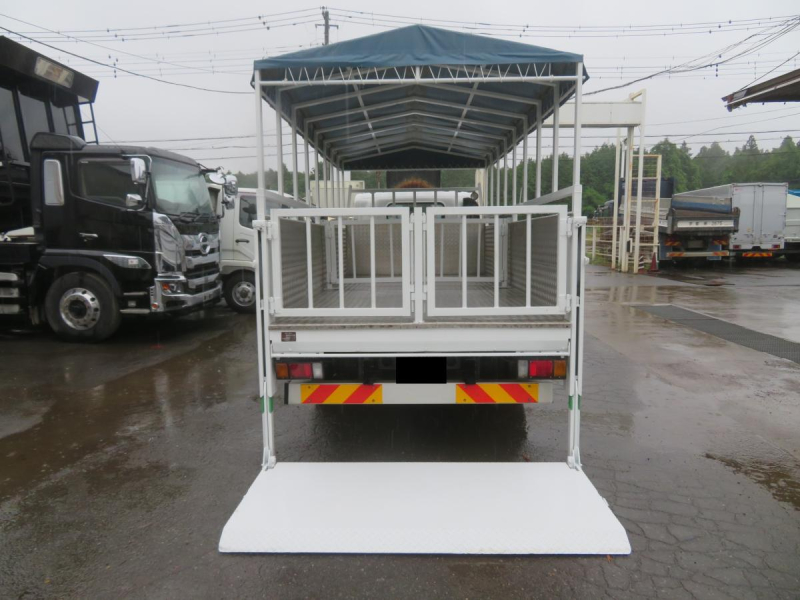 H25年エルフワイド超ロング高床 家畜運搬車PG付　幌新品3.5t積み|中古トラックの販売・買取・査定のアイナビ