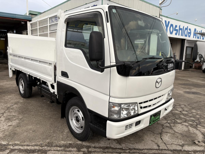H22 タイタンダッシュ　1.3t　平ボディ　垂直パワーゲート|中古トラックの販売・買取・査定のアイナビ