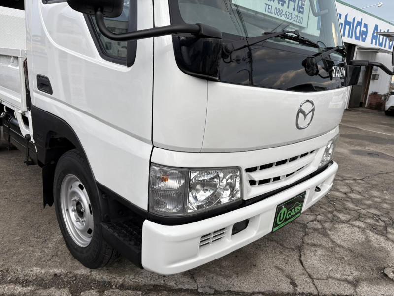 H22 タイタンダッシュ　1.3t　平ボディ　垂直パワーゲート|中古トラックの販売・買取・査定のアイナビ