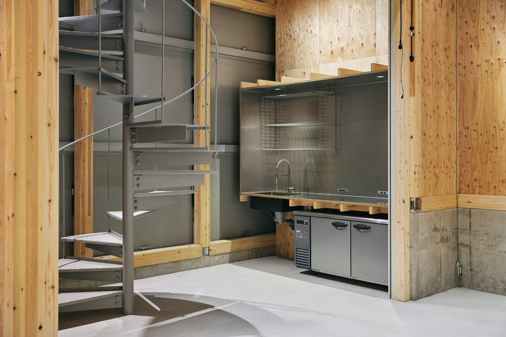 Spiral stair and kitchen inside the nedoko