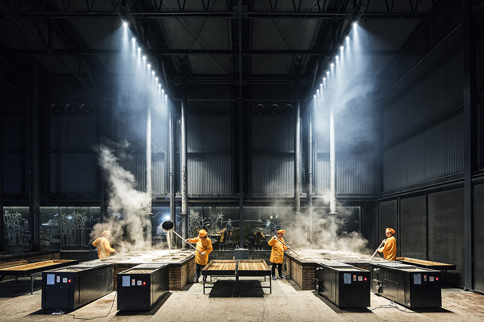 Sugar production beneath steel trusses and rooflights