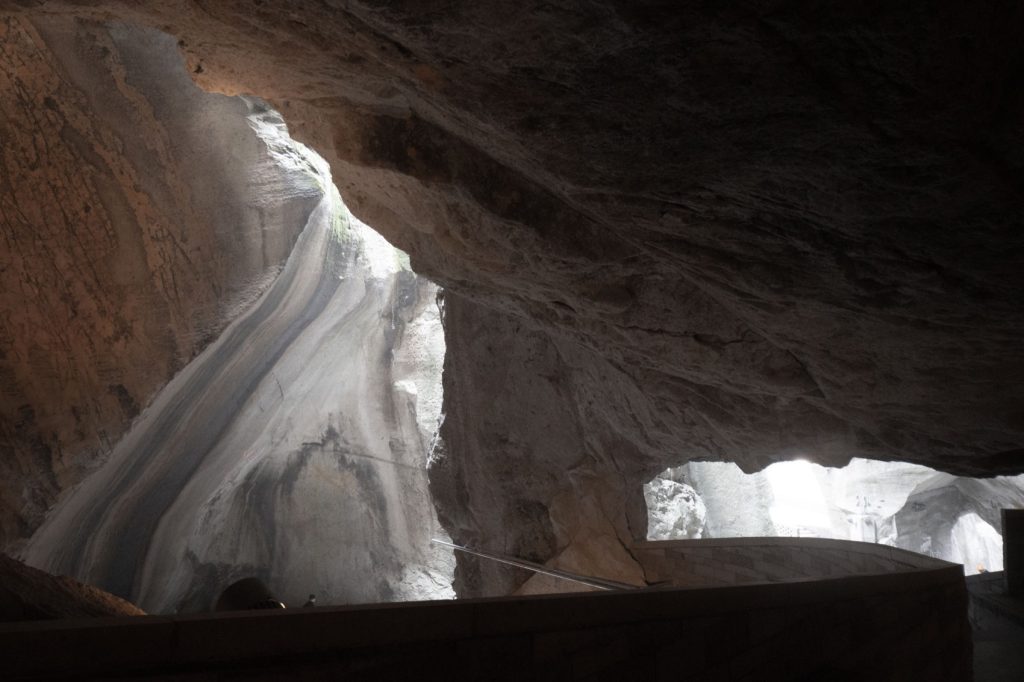 Light entering through a narrow gap in the quarry roof