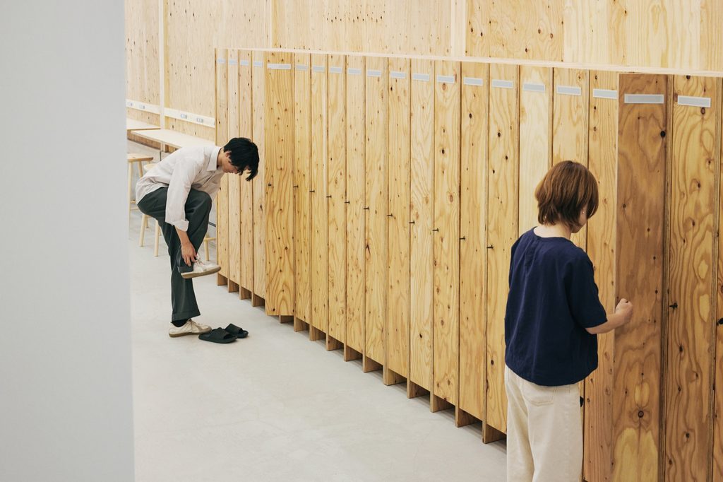 Staff at plywood storage lockers