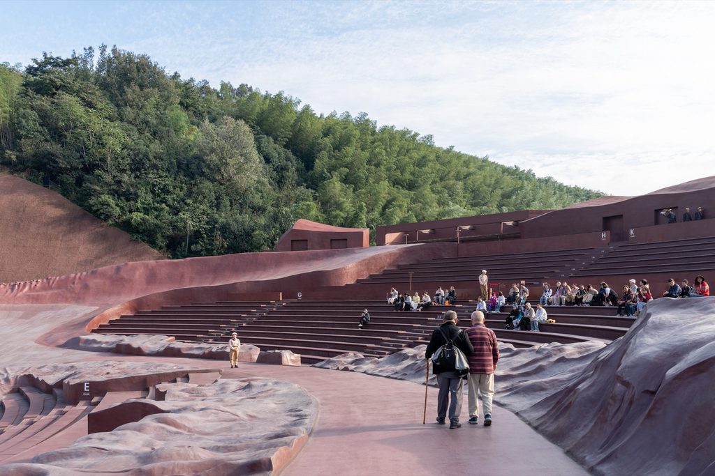 Visitors crossing the performance area