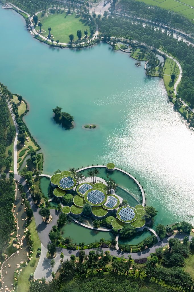 Aerial view of the lake with the clubhouse at its edge