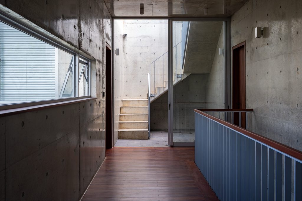 Corridor and stair in exposed concrete