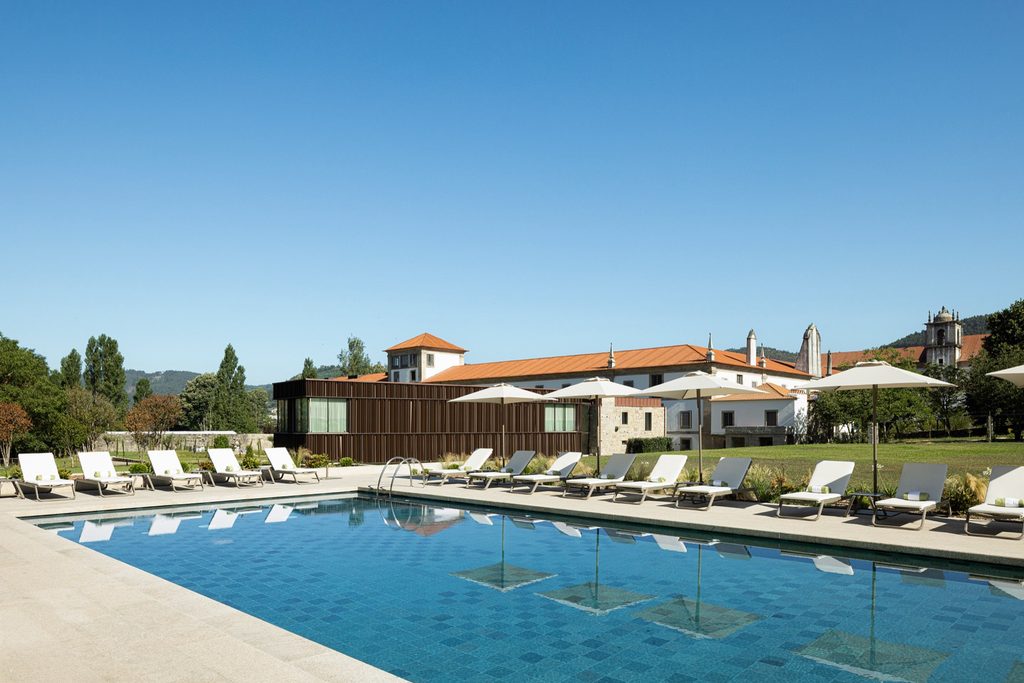 Outdoor pool facing the monastery hotel and spa