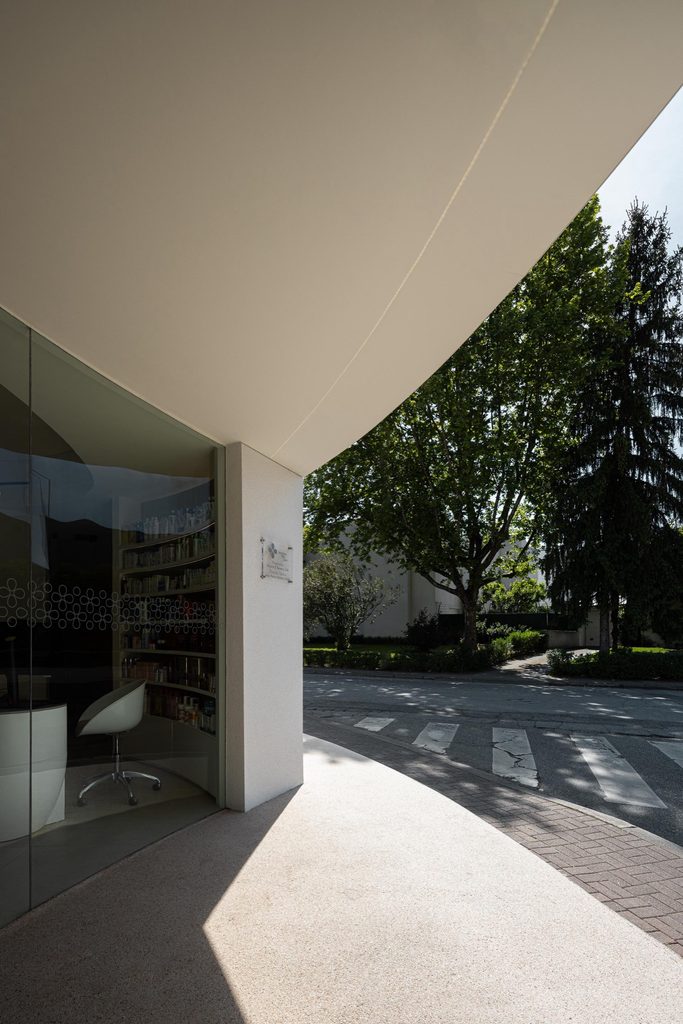 Curved canopy above the glazed shopfront