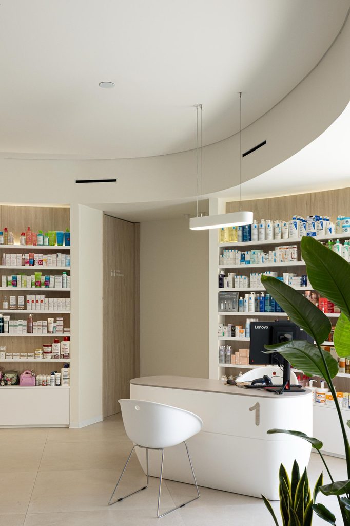 Accessible service counter beside product shelves