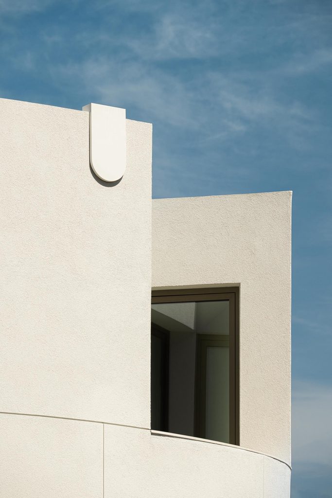 Recessed terrace window in the curved exterior wall