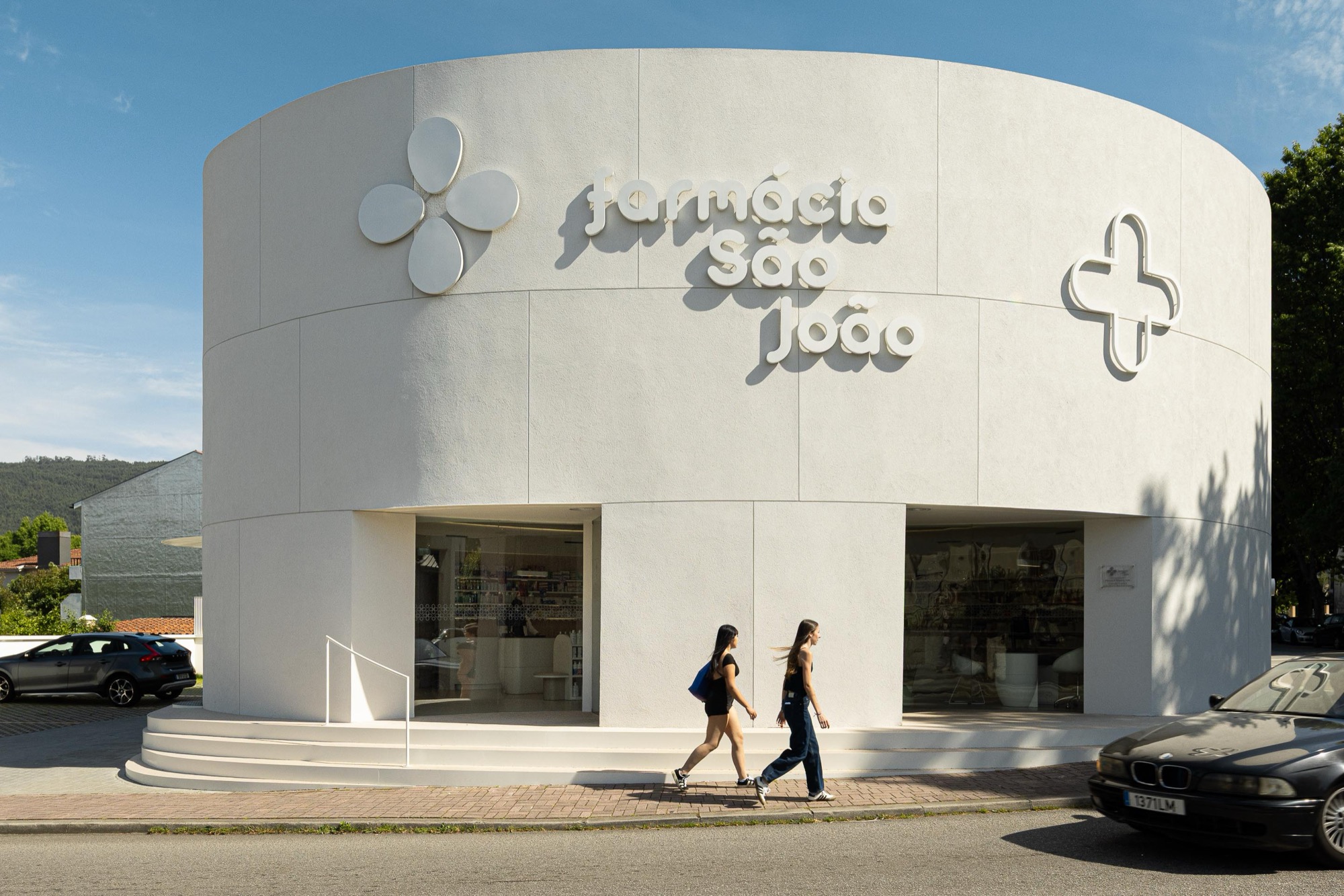 Front entrance and shop windows facing the pavement