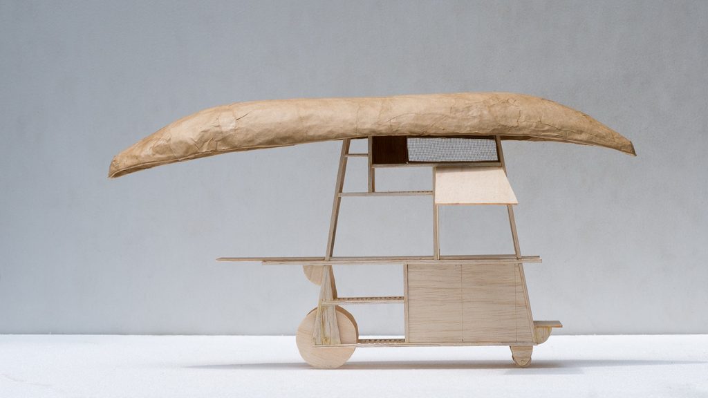 The cart's boat-shaped canopy and serving counter