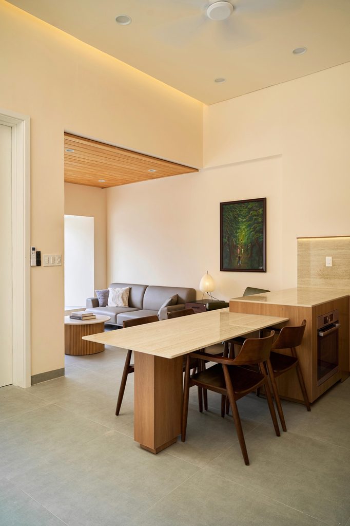 Dining table with the living room beyond