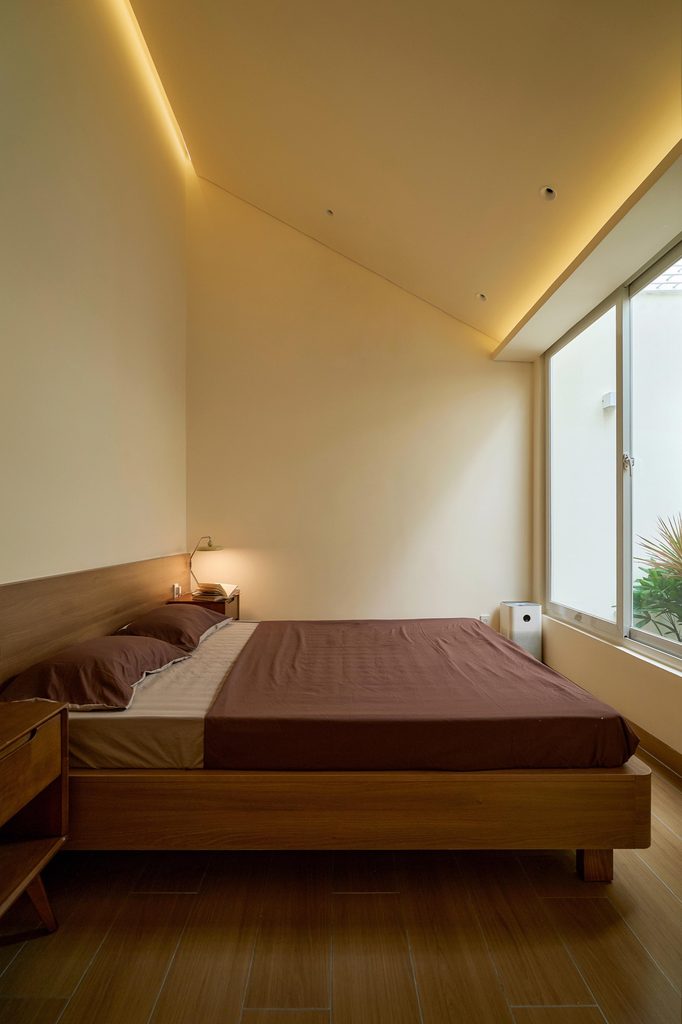 Bedroom under a sloping ceiling