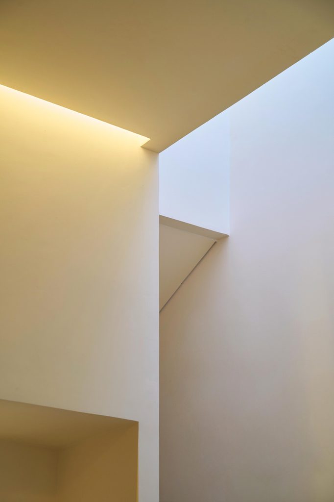 Skylight washing a pale wall