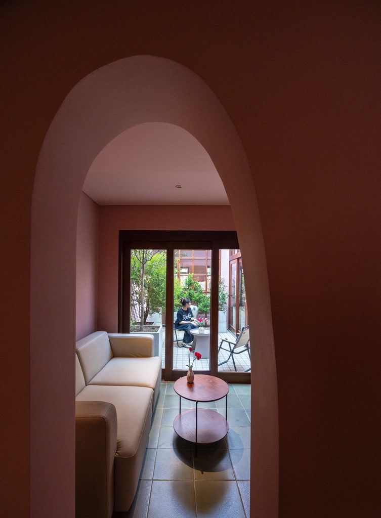 Arched opening framing a lounge area