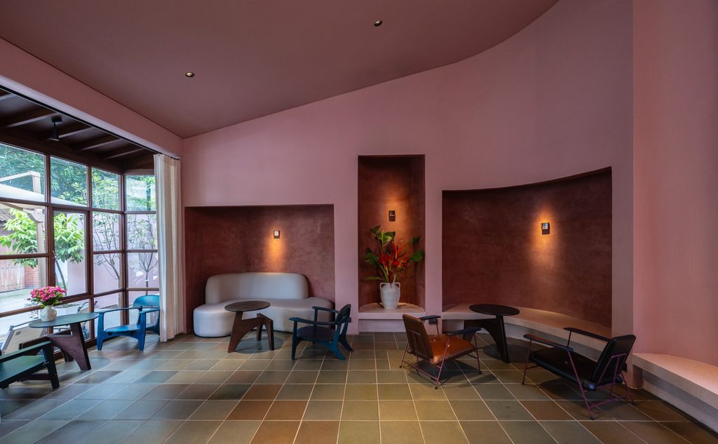 Cafe seating area with built-in benches and wall niches