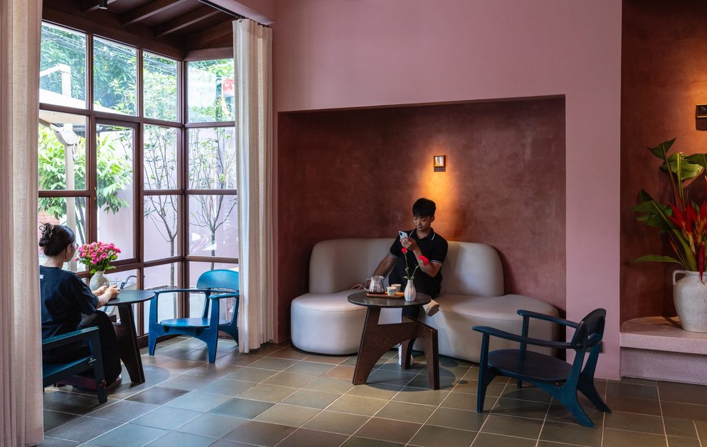 Cafe seating beside large windows