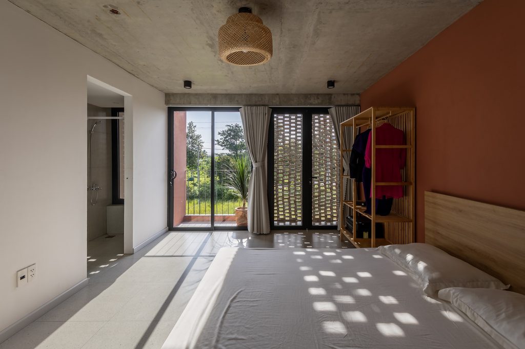 Bedroom with timber furniture and filtered sunlight
