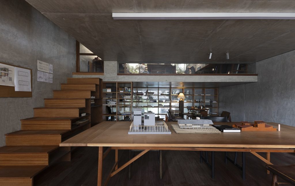 Timber stair and table on an upper floor