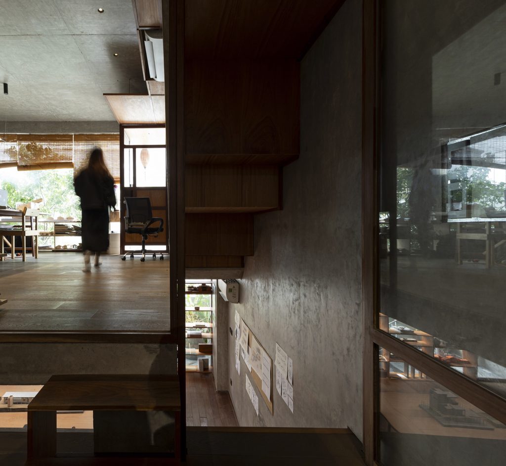 Timber stair passing between floors