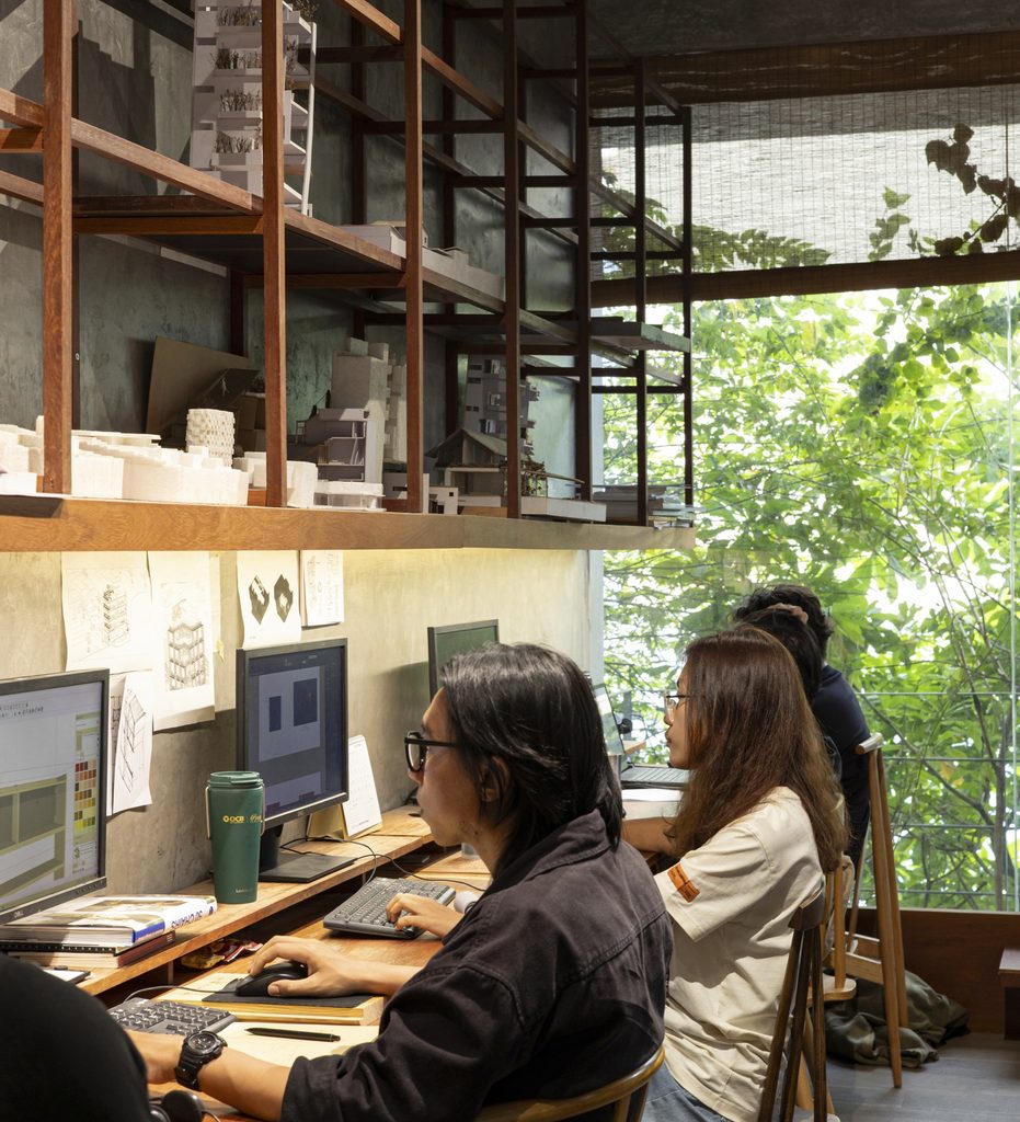 Designers at work by the window