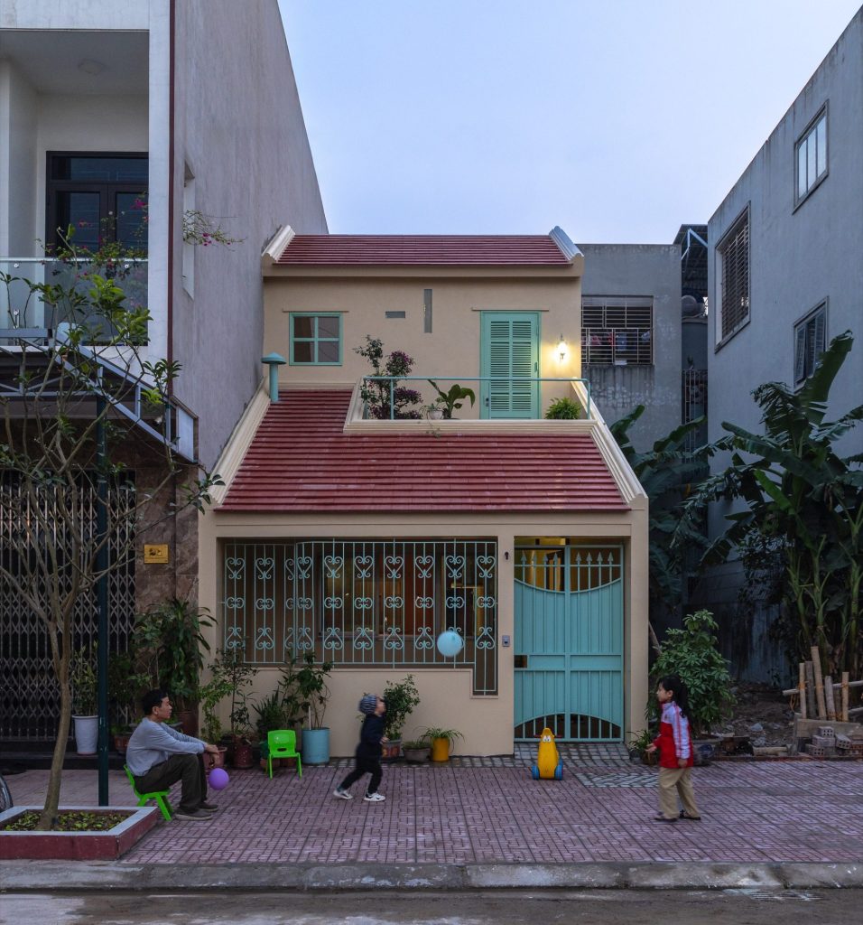 Evening facade with people outside the entrance