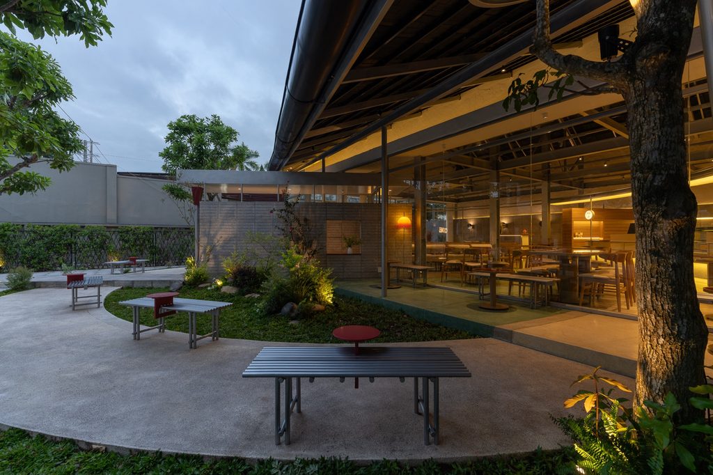 Yard with tables and the deep roof edge