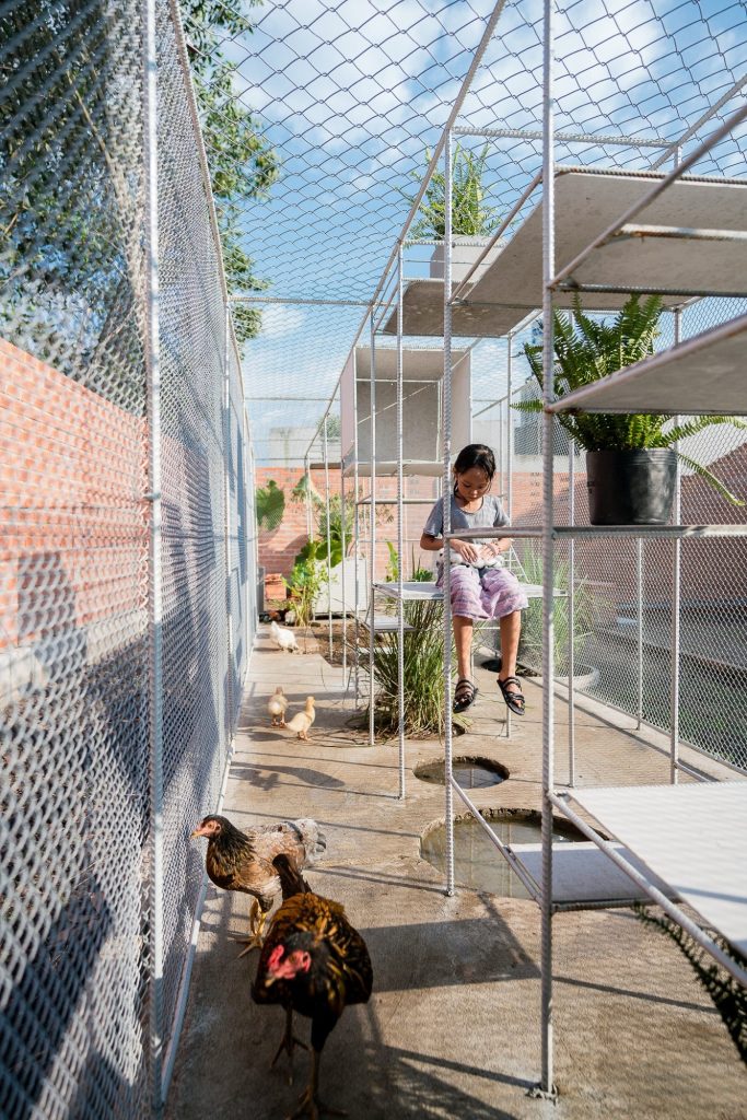 Children playing on the boxes and stairs