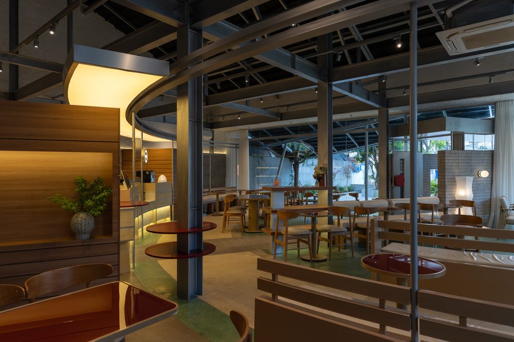 Curved timber-lined wall and seating
