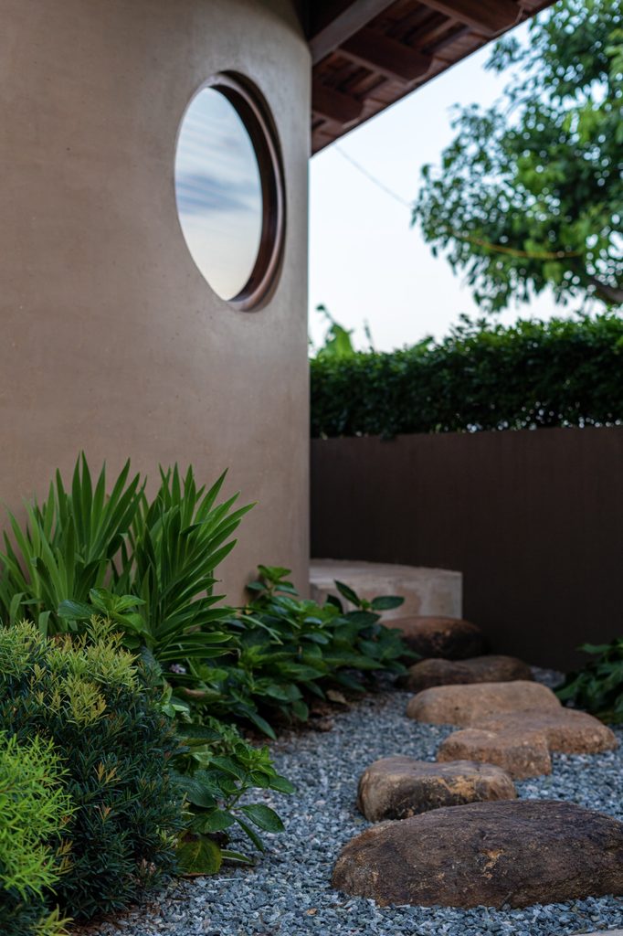 Circular window overlooking the courtyard garden