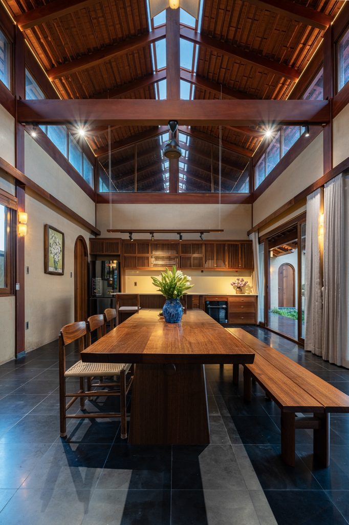 Dining room beneath a high timber ceiling