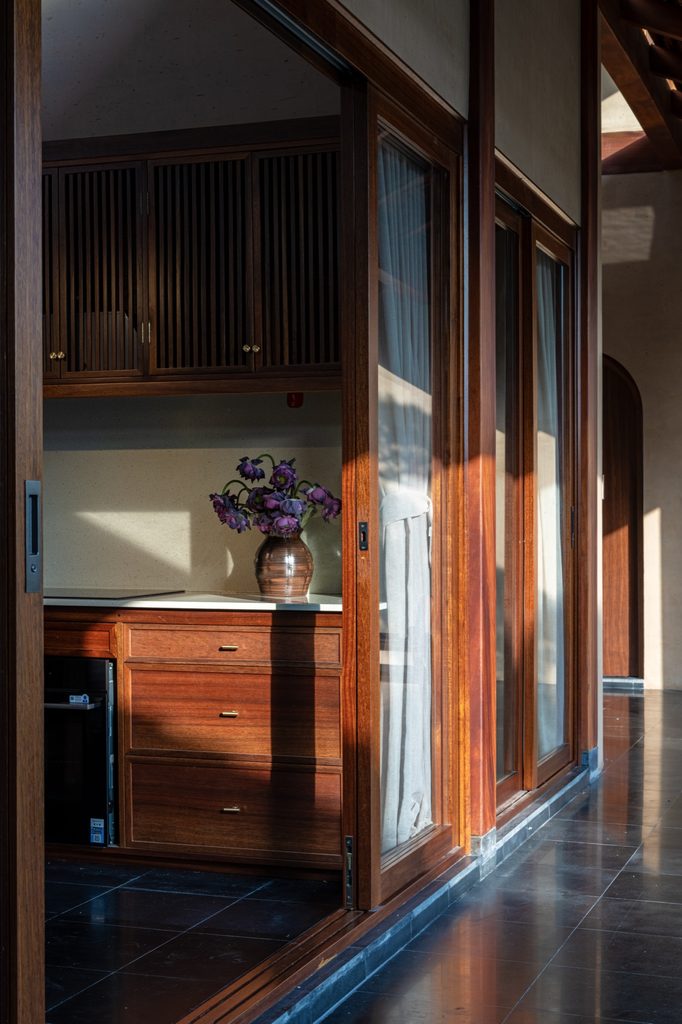 Bedroom doorway and timber cabinetry