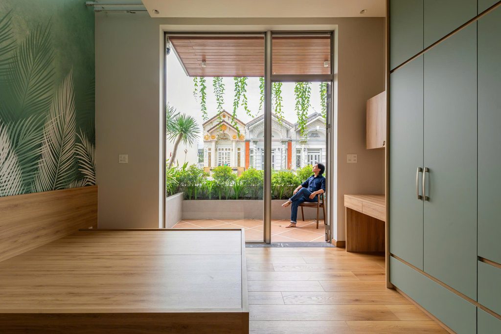 Bedroom opening onto a recessed balcony