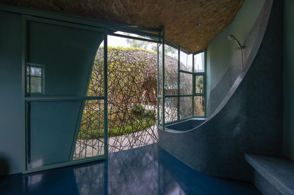 The room at dusk looking out to the garden